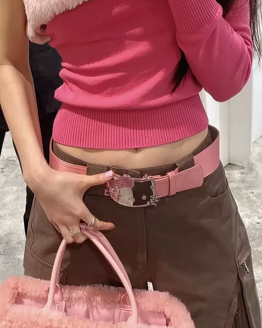 Hello Kitty Pink Belt worn with pants as a kawaii style fashion accessory