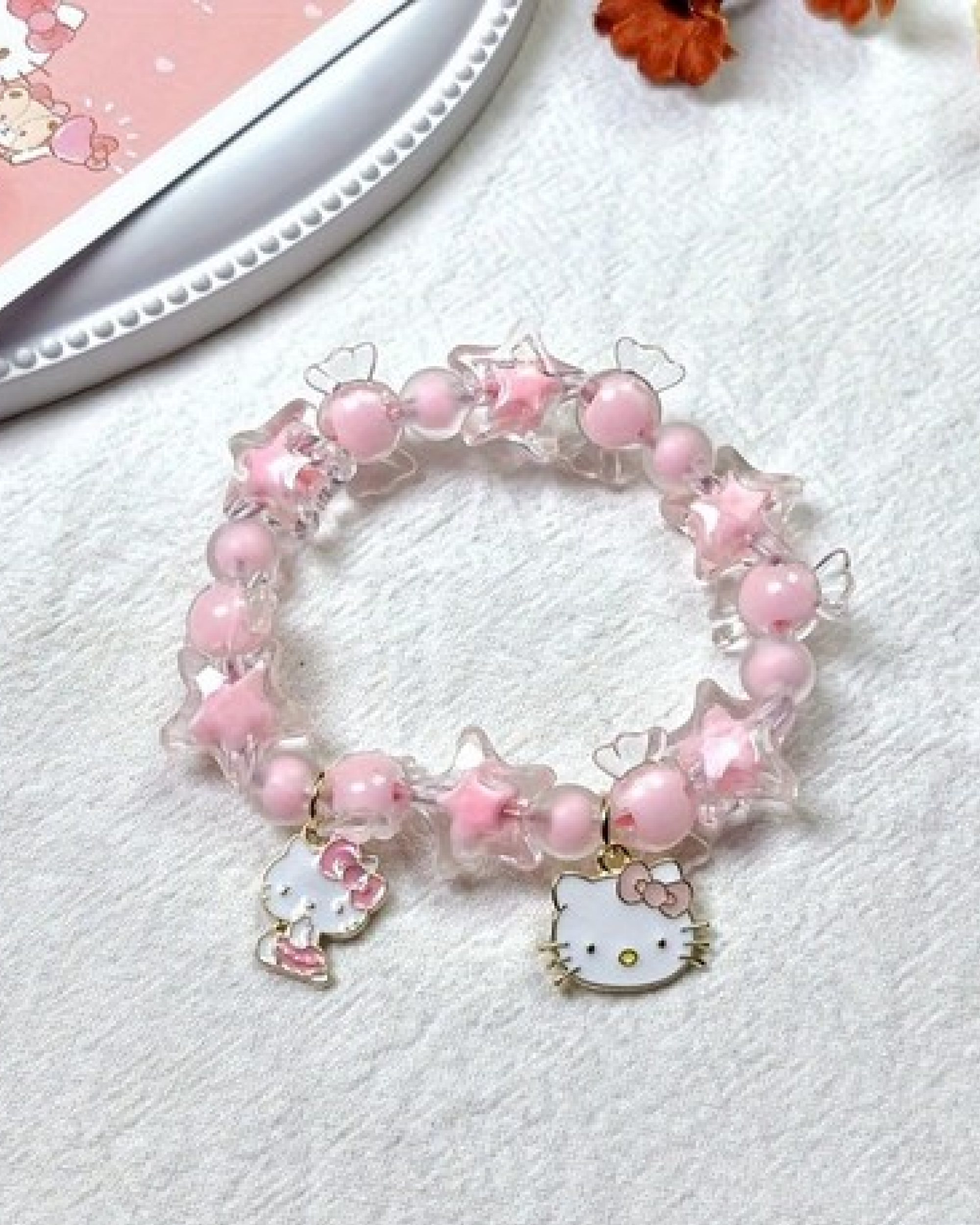 Hello Kitty Candy Star Bracelet worn on the wrist as a cute pastel kawaii accessory