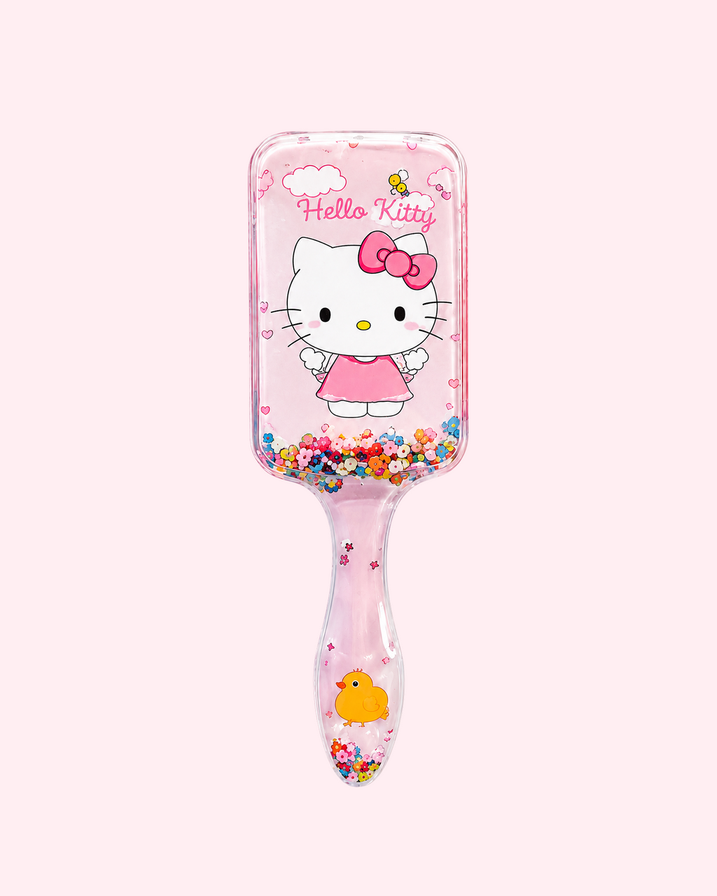 Cute light pink Hello Kitty hair brush with transparent handle, colorful glitter and adorable cat print