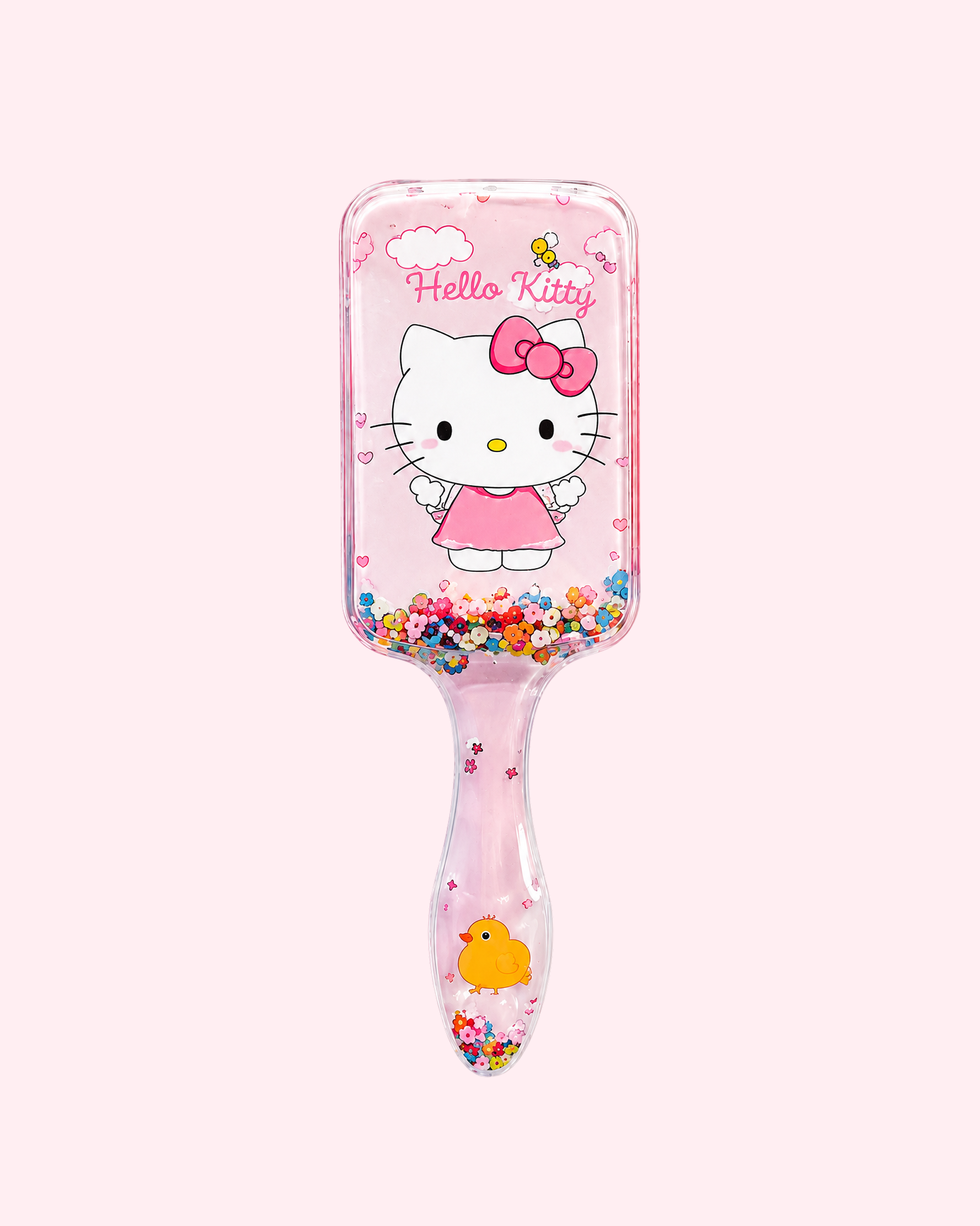 Cute light pink Hello Kitty hair brush with transparent handle, colorful glitter and adorable cat print