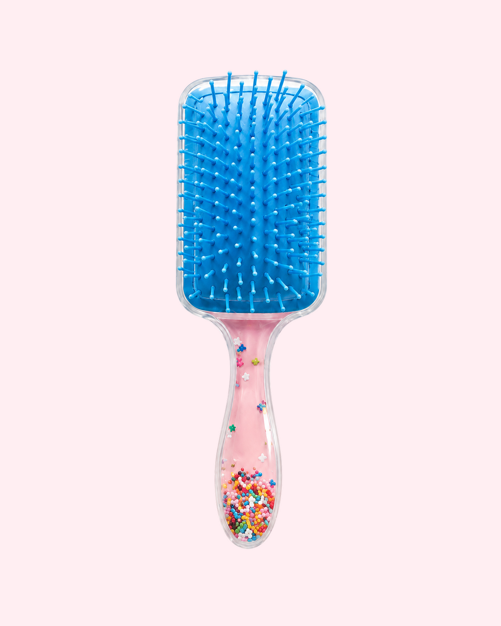 Hello Kitty Blue Glitter Hair Brush with blue bristles, transparent handle and colorful floating glitter