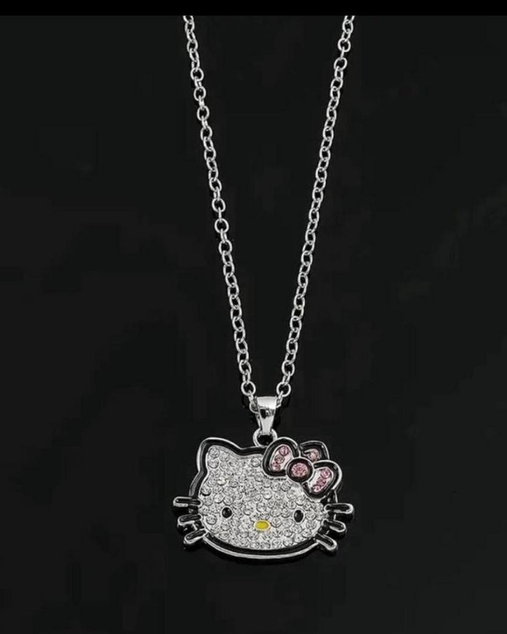 Hello Kitty glam cat necklace worn as bold kawaii statement jewelry