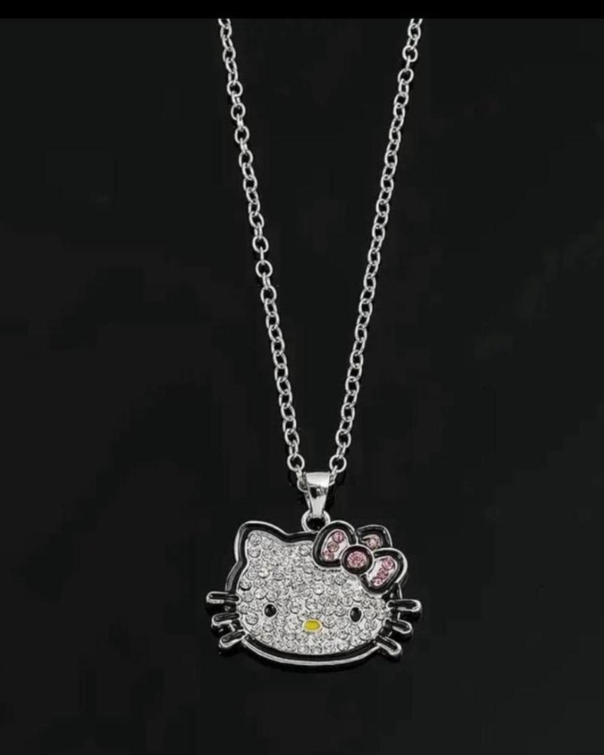 Hello Kitty glam cat necklace worn as bold kawaii statement jewelry
