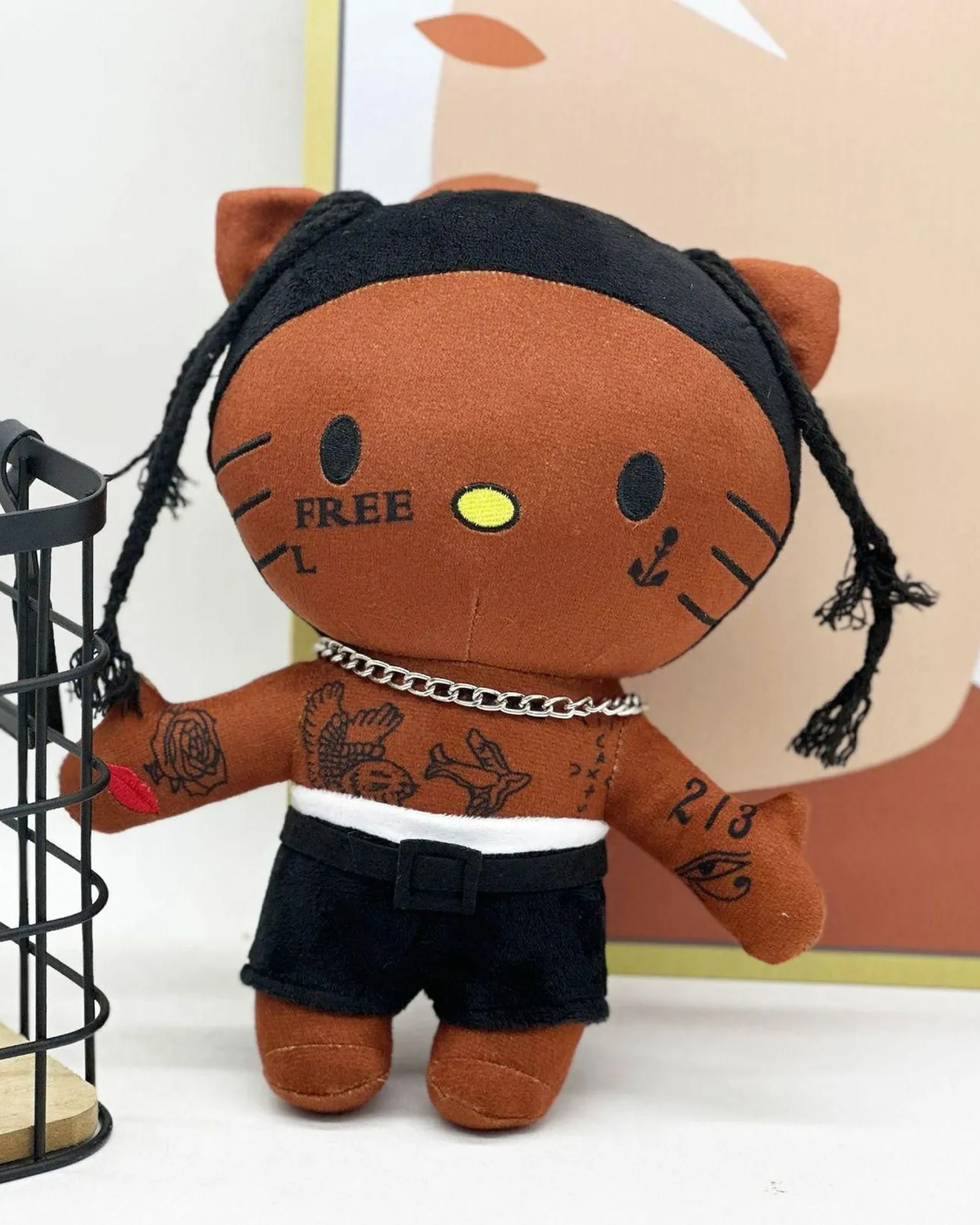 Travis Scott x Hello Kitty plush with dark Astroworld kawaii style made for rap fans.