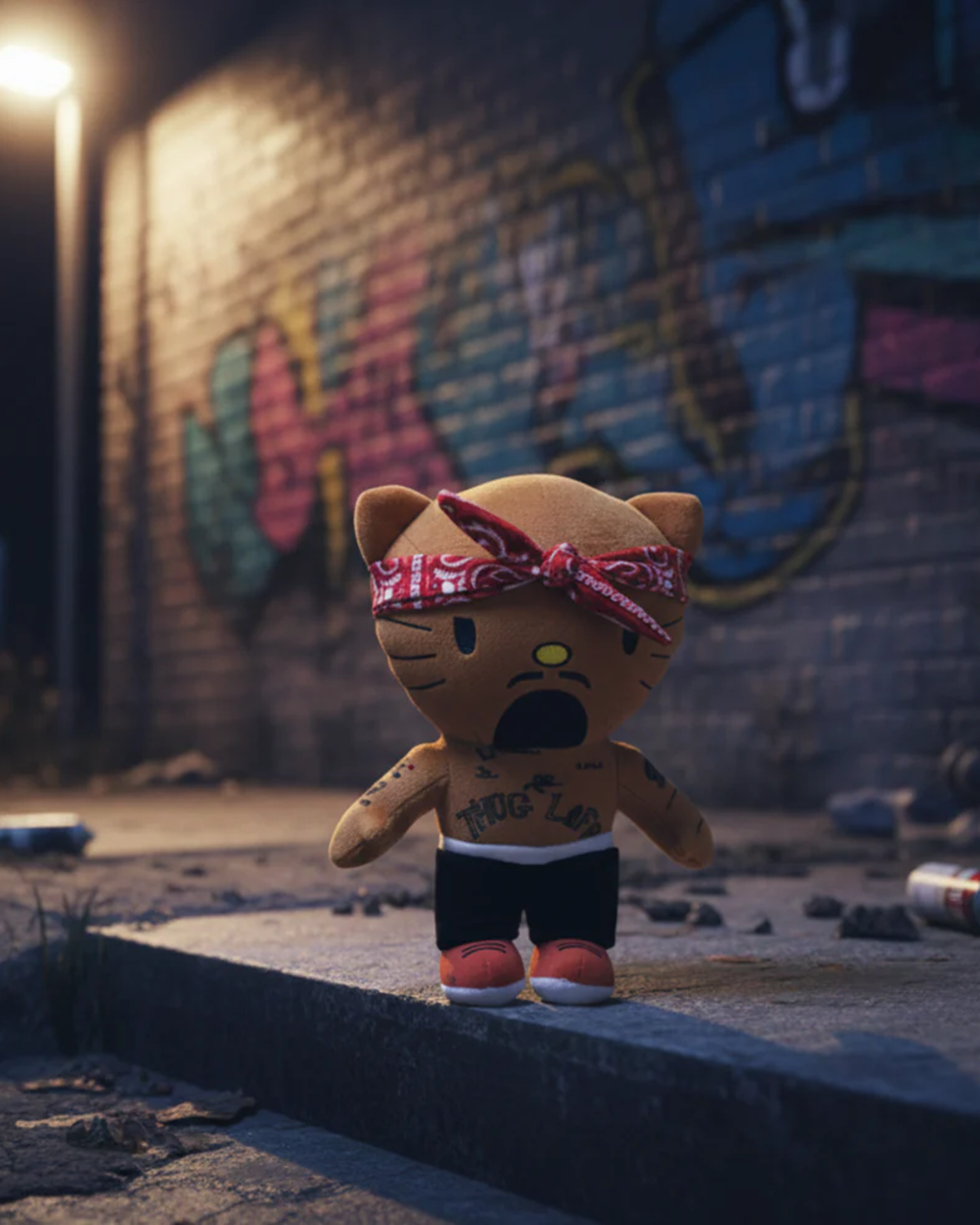 Tupac x Hello Kitty plush standing outside in Yota Kitty decor