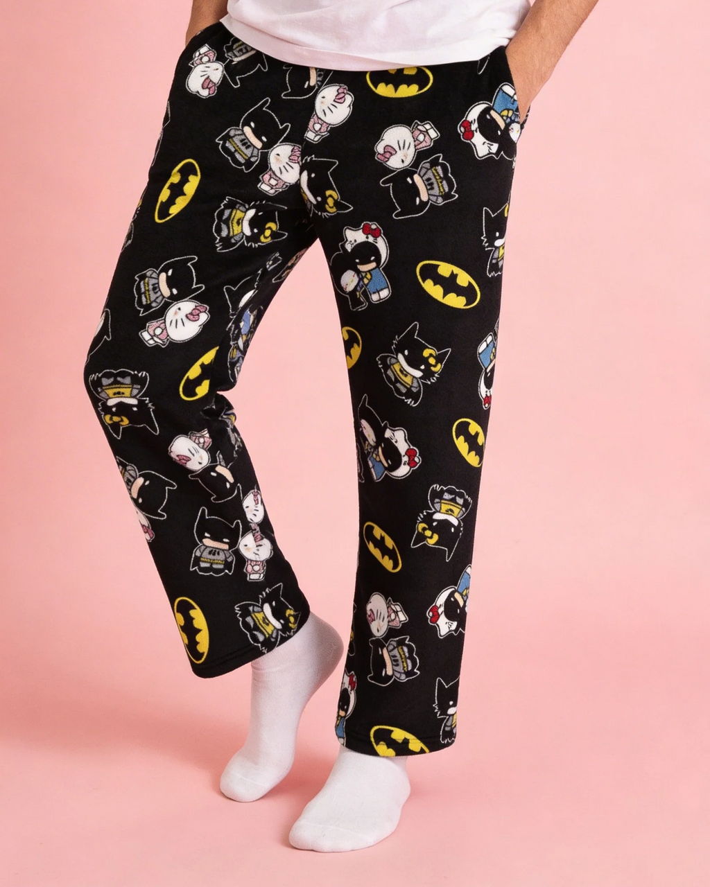 Dark hero-inspired Hello Kitty pajama pants with kawaii print