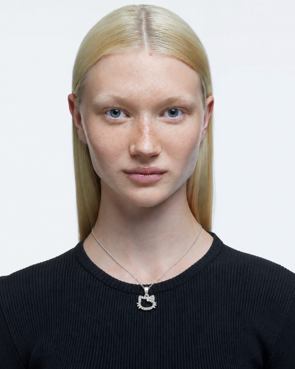 Hello Kitty outline cat necklace worn as delicate everyday kawaii jewelry