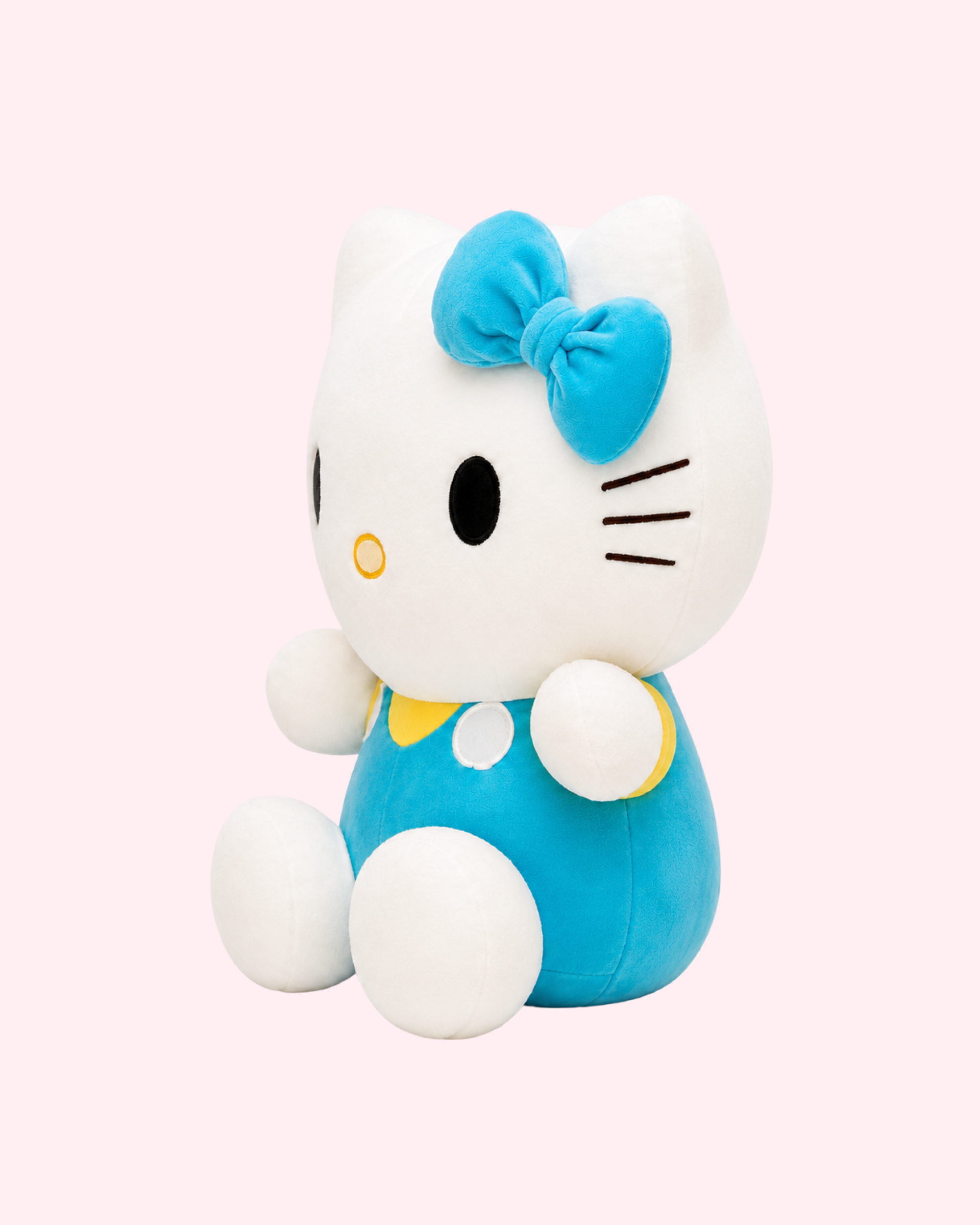 Blue and yellow Hello Kitty plush toy with cute face and charming collectible design