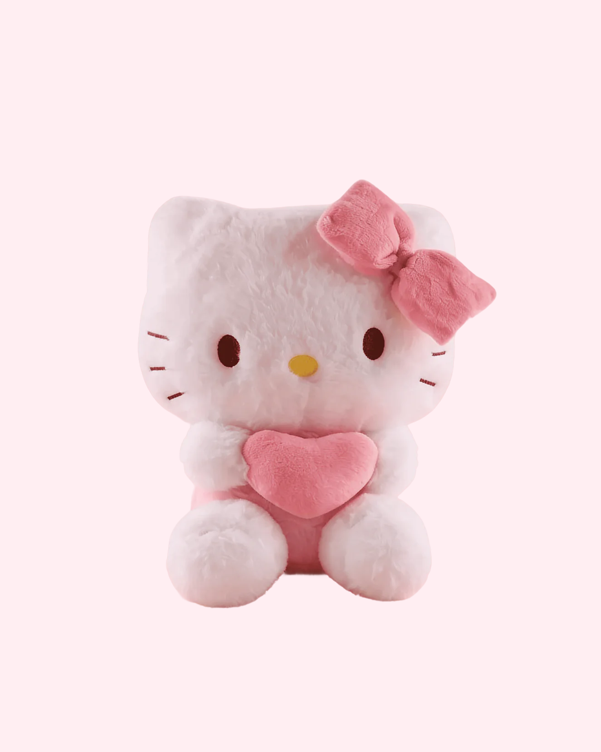 Hello Kitty Heart Plush 20 cm with pink bow, soft heart detail and adorable kawaii design