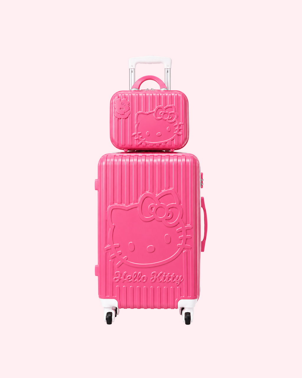 Aesthetic vibrant fuchsia Hello Kitty cabin suitcase with matching mini vanity travel bag set